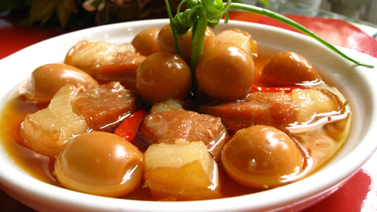 Thit Kho Tau: Caramelized pork with eggs cooked in coconut water.